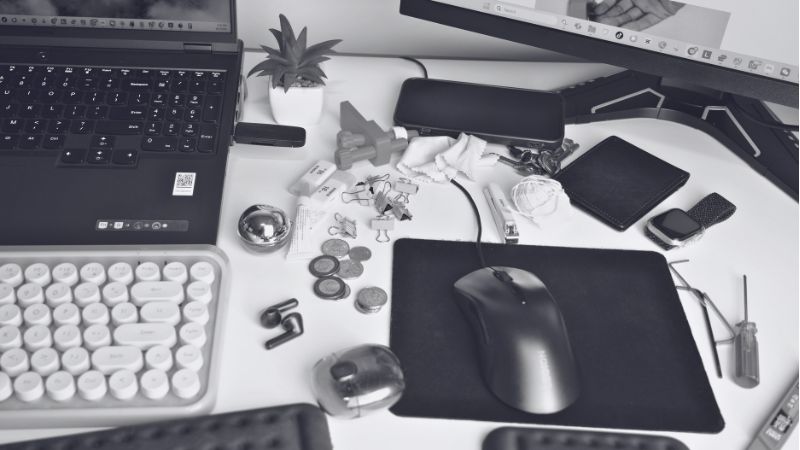 A cluttered desk by end of day